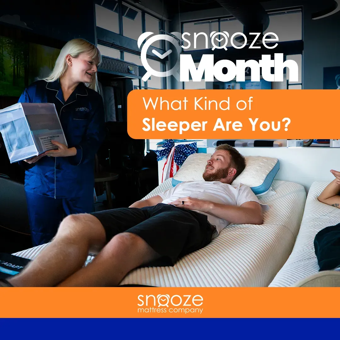 Snooze employee and man discussing mattress